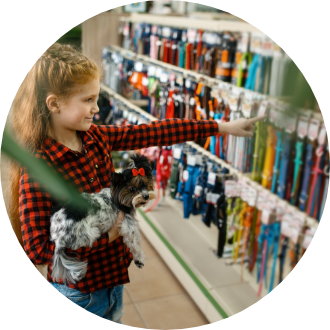 little-girl-choosing-leash-and-collar-pet-store-2021-08-27-09-40-21-utc