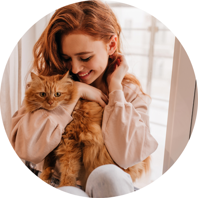 relaxed-smiling-girl-playing-with-her-fluffy-cat-2022-02-01-22-37-35-utc